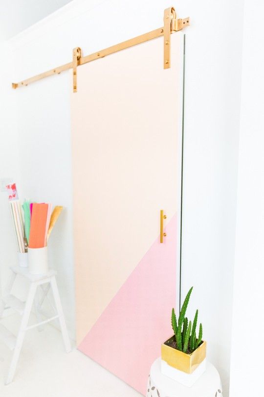 This DIY colorblocked barn door is a modern take on this well-loved sliding door...