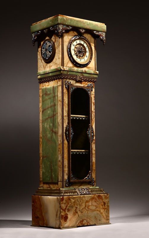 A French gilt-bronze and champleve enamel-mounted onyx pedestal clock Last quart...