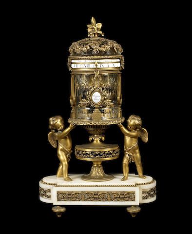 A French late 19th century Louis XVI style gilt-bronze, crystal glass and white marble rotary mantle clock by Robin, Paris
