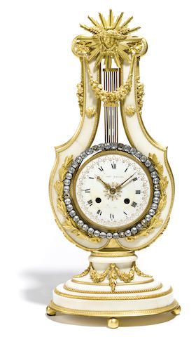 A Louis XVI style gilt bronze and marble mantel clock late 19th century