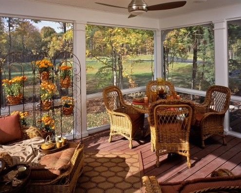 Screened porch with columns - LOVE... also neat idea to attach a trellis inside ...