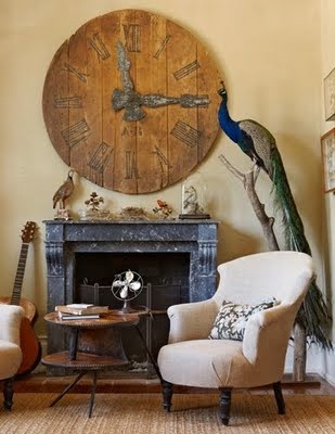 Every room looks better with its own stuffed peacock!