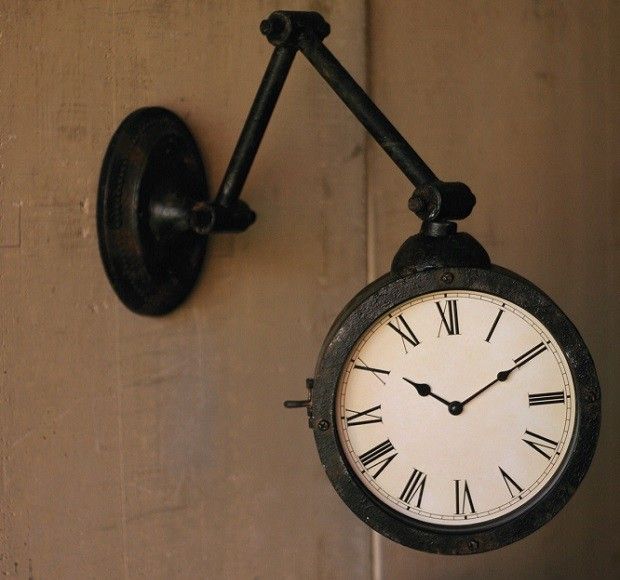 Metal Wall Clock On Metal Arm