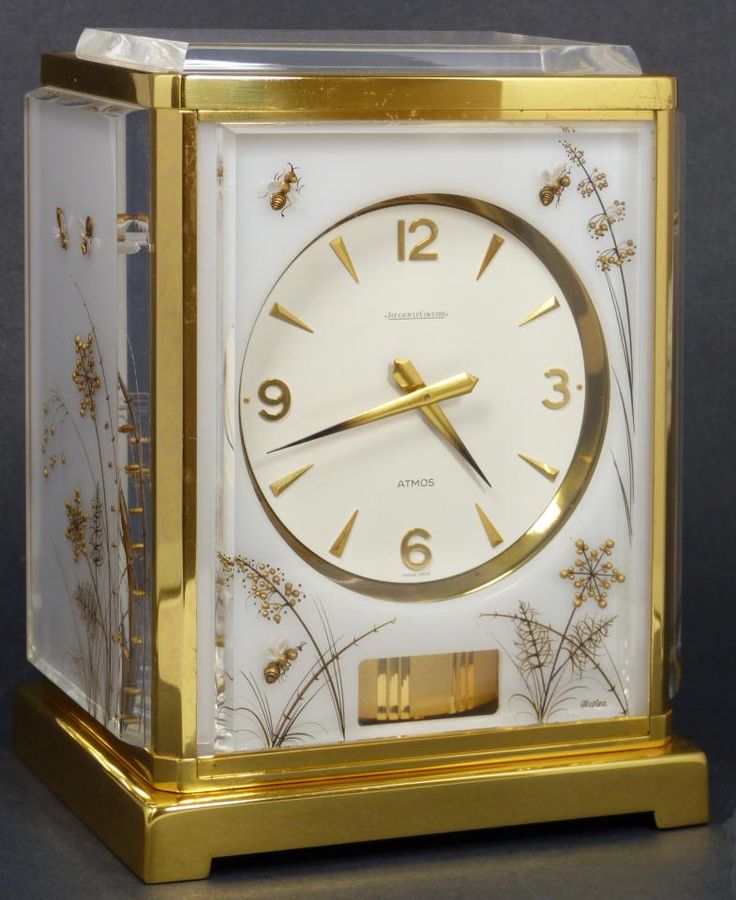 Jaeger LeCoultre White Caravelle Atmos clock with a honey bee design. Enchanting...