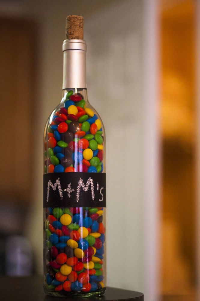 Take your empty wine bottles and turn them into adorable candy dispensers