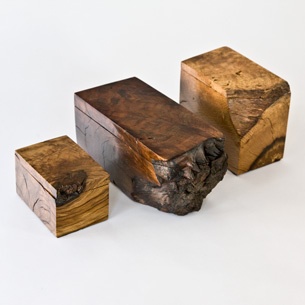 Wood boxes with a natural edge.