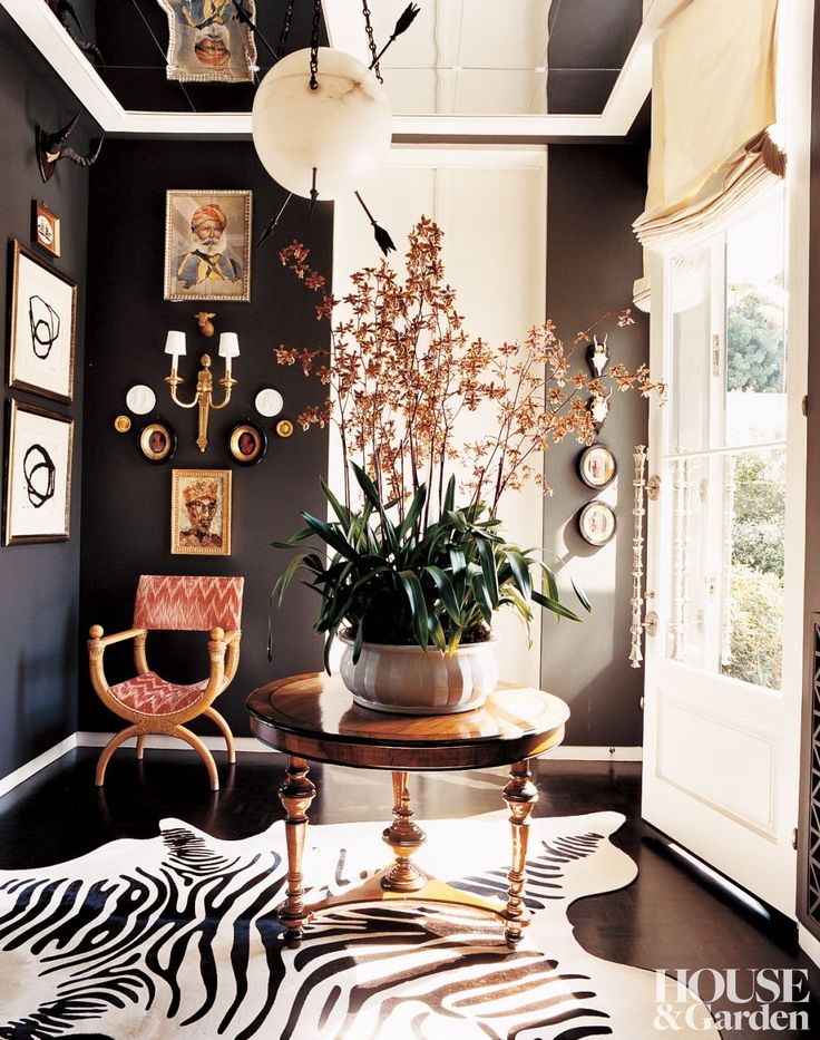 2 Top Designers Decorate One Amazing Home//Black walls, zebra hide