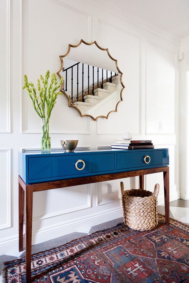 blue console table, wood legs