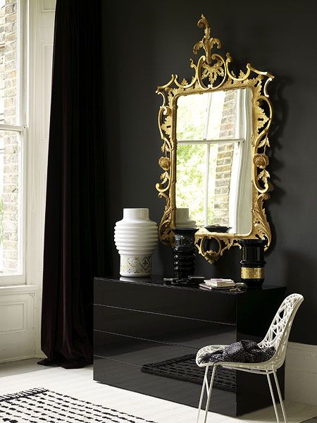 Gold gilt mirror, black laquer and walls