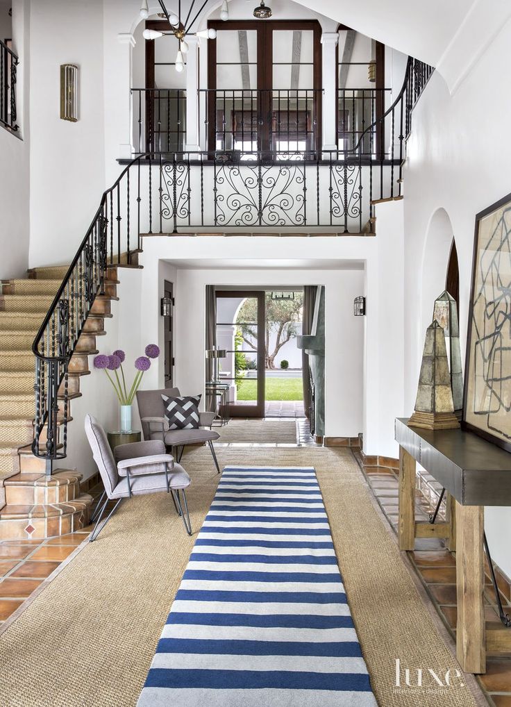 Spanish Colonial Neutral Entry with Purple Chairs