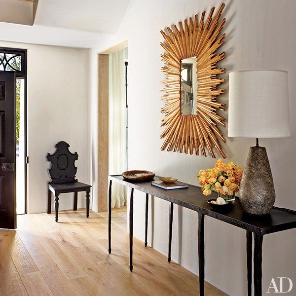 This Hamptons Home is Pretty Much Perfect// modern console, gilt wood mirror, ec...