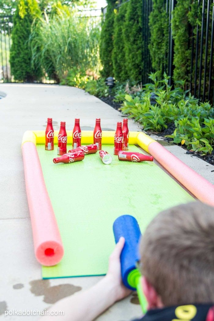 DIY Outdoor Bowling Game, made using Coke bottles, a yoga mat and pool noodles!!...