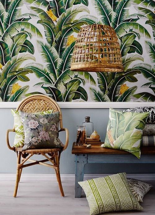 Tropical beach interior with cane chair palm print wallpaper & cushions &amp...