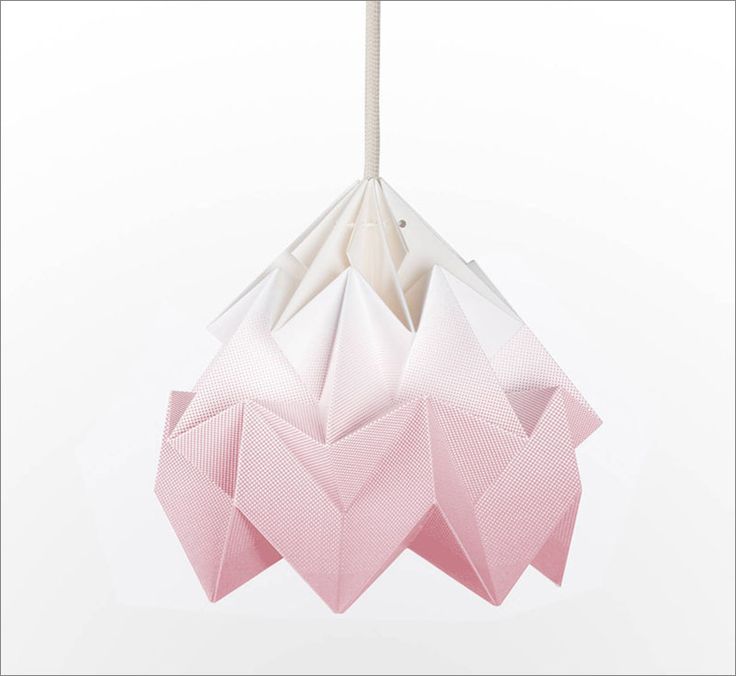 This blush pink origami pendant light with intricate folds, creates a warm glow ...