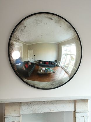 Antique glass convex mirror