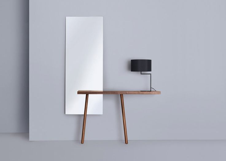 Florian Schmid's two-legged tables intersect with mirrors...