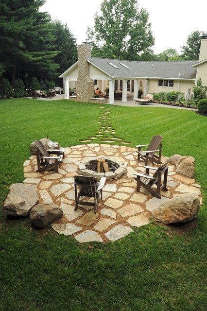 A fire pit would go perfectly at the back of the yard, near the creek for cooler...