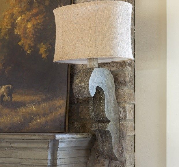 Corbel Sconce | Architectural Sconce. Not used to seeing sconces on sides of man...