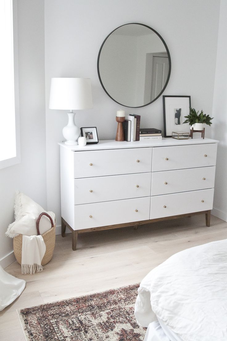 The perfect white dresser in this modern, scandi styled bedroom redesign