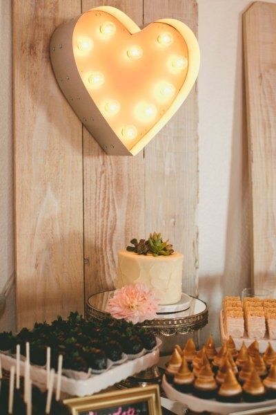 heart marquee over the dessert table