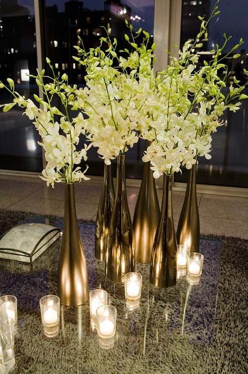 Gold Sprayed New Years Wine Bottle With Orchids as Centerpiece for 2015 - New Ye...