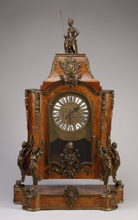 19th century Louis XV style bronze mounted marquetry inlaid clock, featuring a b...