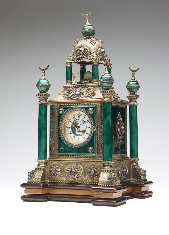 A Continental silver-gilt & enamel mantle clock...