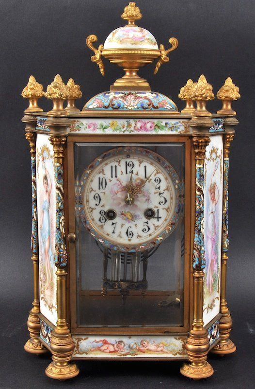 A Fine 19th Century French Champleve Enamel And Porcelain Mantle Clock.