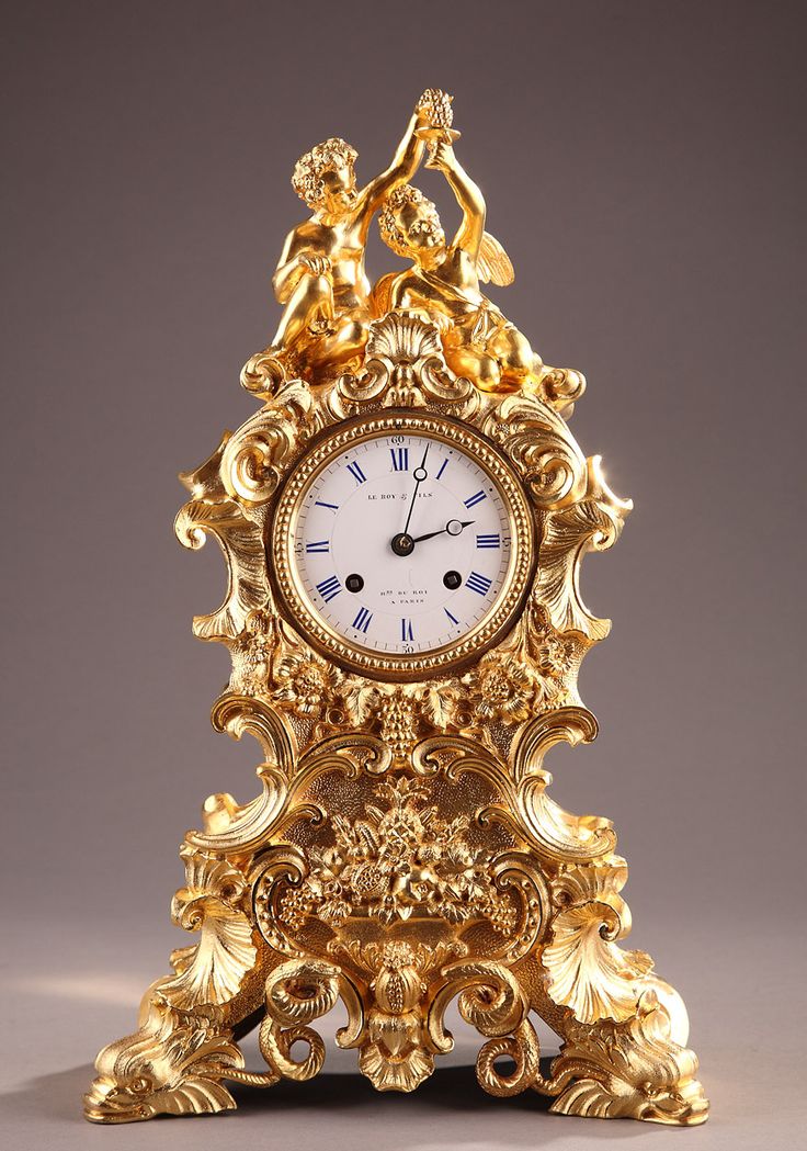 A French 19th Century Ormolu Clock in Rococo Style.
