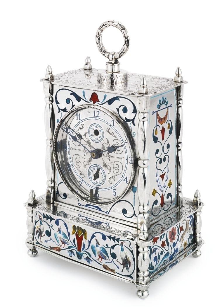 A GERMAN SILVER AND ENAMEL MANTEL CLOCK, CIRCA 1880 the sides with shaded and tr...