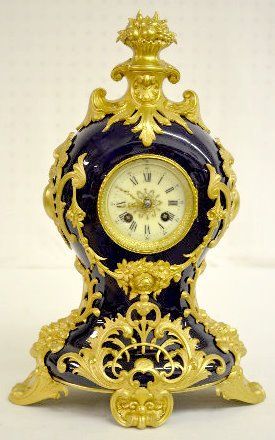 French Porcelain and Gilt Metal Clock: