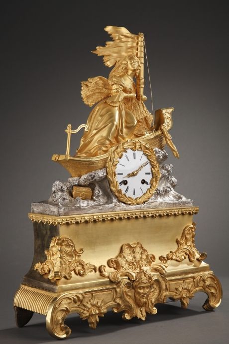 Ormolu and silvery bronze Romantic clock representing Virginia on the ship shipw...