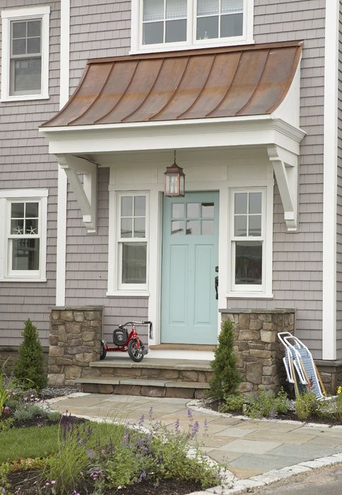 covered entry without impacting setback, turquoise door...