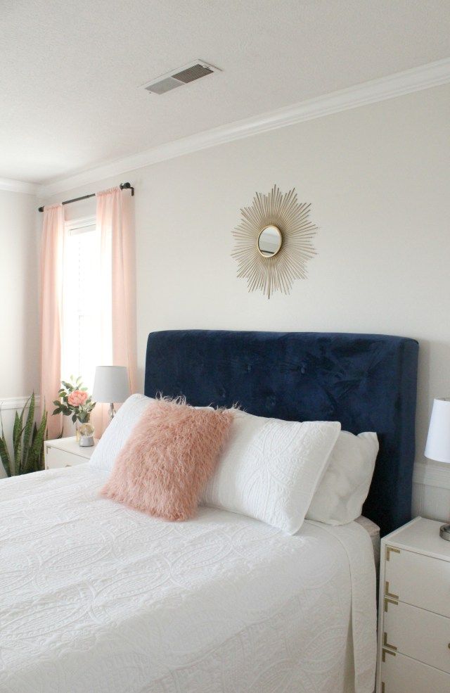 Gorgeous teen bedroom with a DIY tufted headboard. This space is glamorous and s...