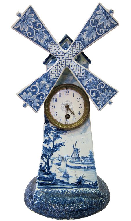 Dutch windmill clock is sculpted from pottery & hand designed with the tradition...