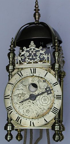 english lantern clock with moondial : circa 1630