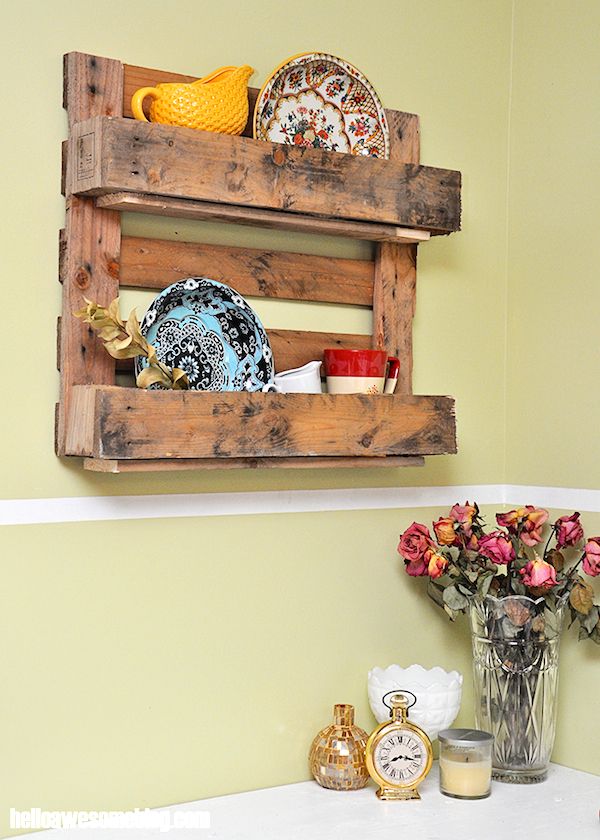 Make a Decorative Pallet Shelf - diycandy.com
