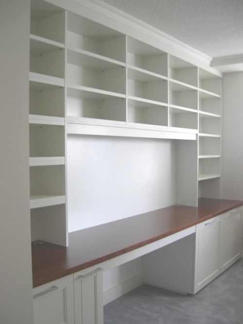 Built in book shelf and desk to surround a window (need fewer shelves above desk...