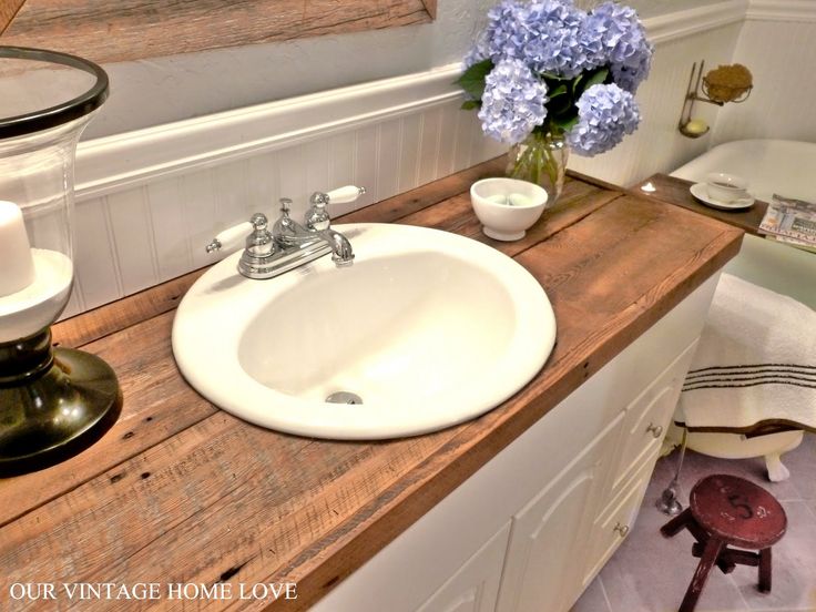 Hate your countertops? DIY salvaged wood counter...cheap and so much more awesom...