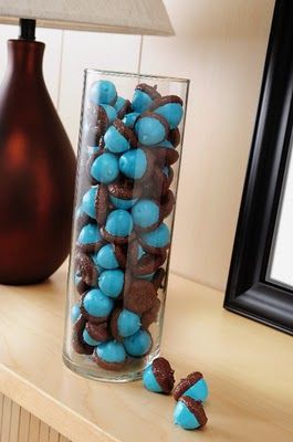 I painted my acorns 2 shades of blue and added some orange ones. I displayed the...