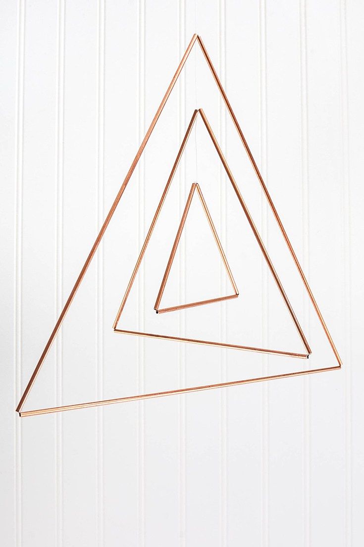 Make a copper triangle mobile, then hang it either indoors or outside....