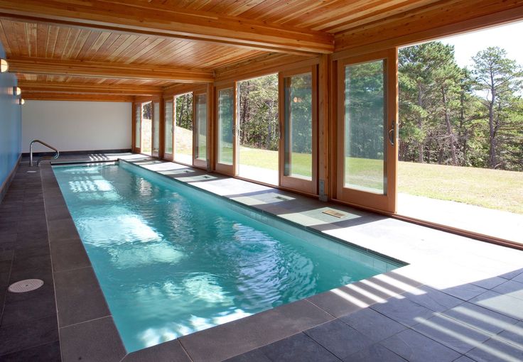 Terrific Sliding Glass Doors Covering Indoor Swimming Pool