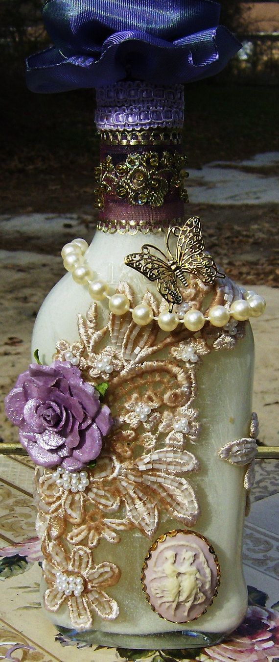 Altered bottle, embellished with scraps of lace & beads + this post has a lot of...