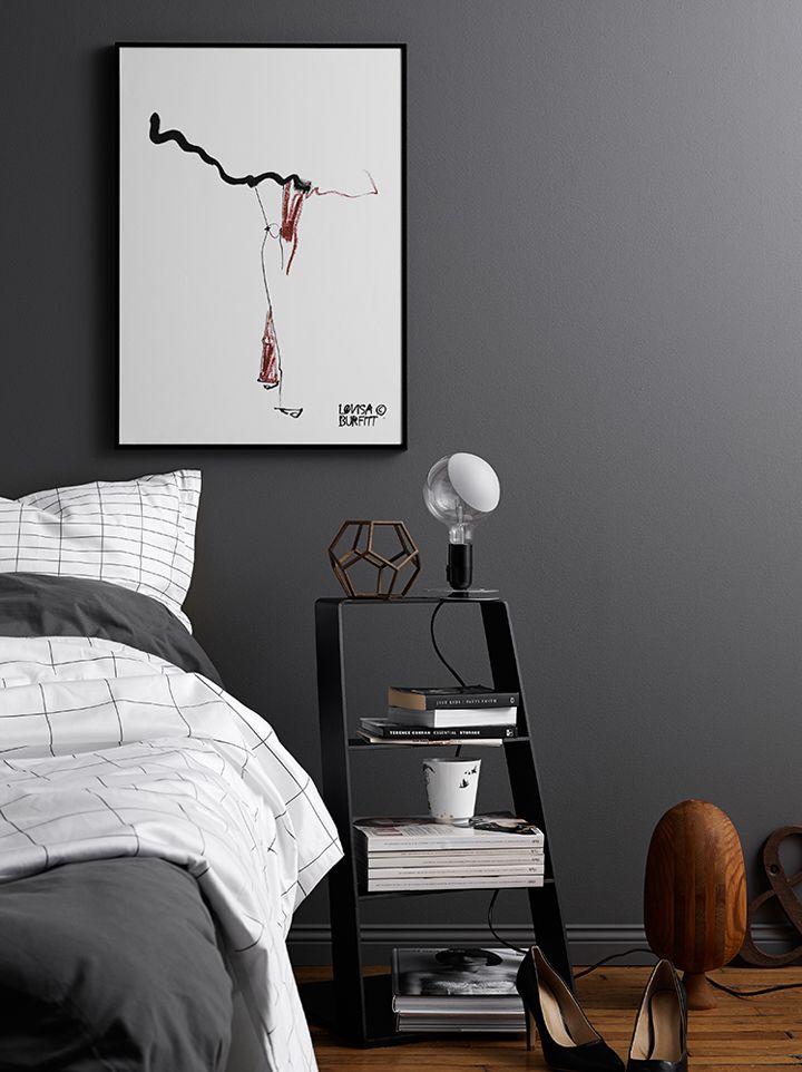 Dark grey wall and fashion illustrations in the bedroom | 79 Ideas