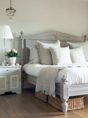 Grey bed frame n headboard. Like the idea of long thin baskets under bed for sto...