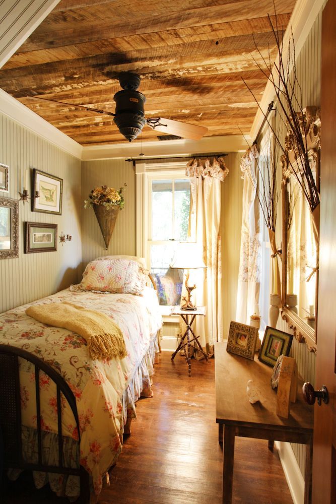 I'd have a hard time leaving this small cottage bedroom.