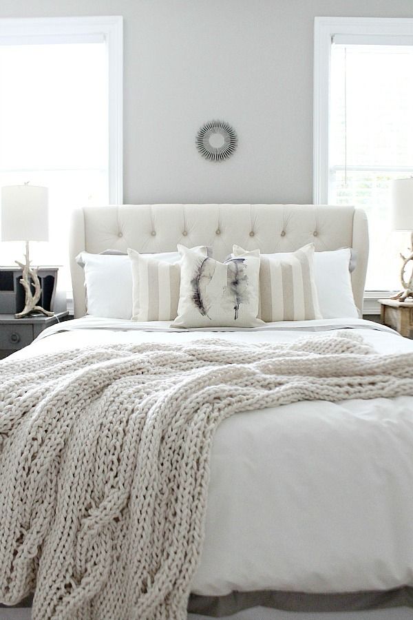 Love this winter white farmhouse style bedroom refresh! Find affordable ideas fo...