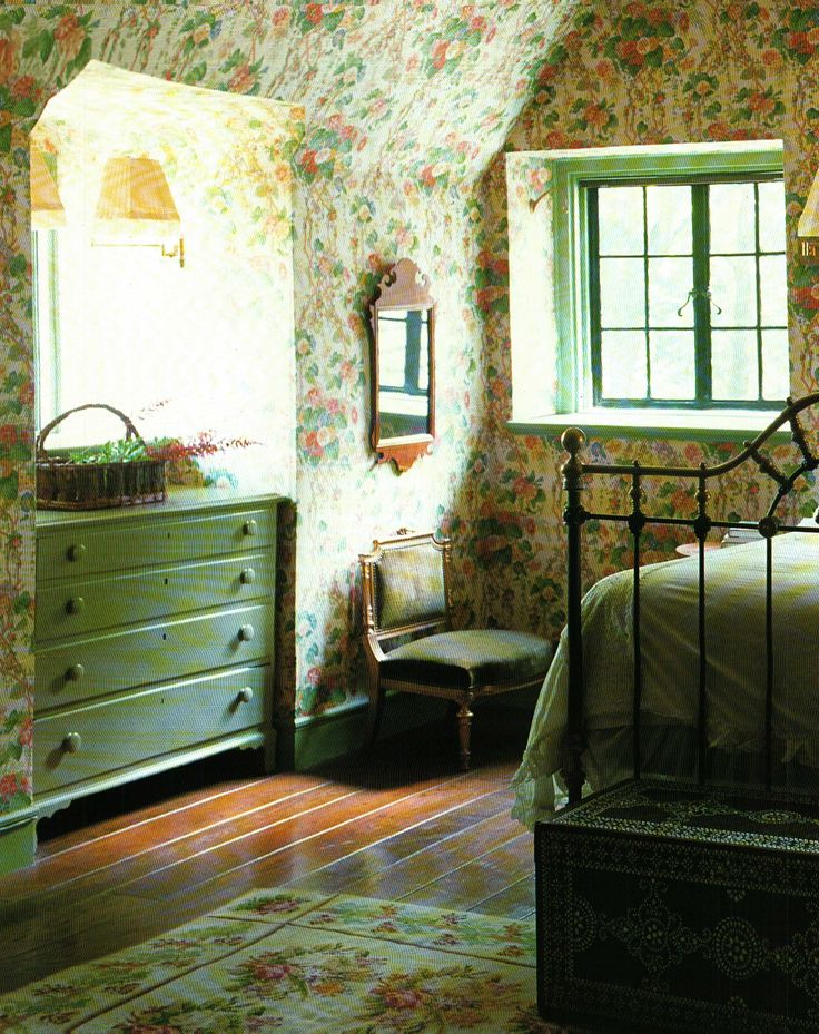pretty green English cottage bedroom love that the dresser is tucked into the wa...