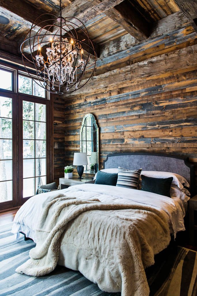 Rustic cabin bedroom by Timothy Johnson Design