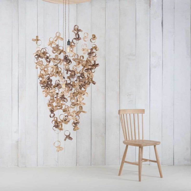 A Chandelier Made From Over 120 Steam-bent Shapes